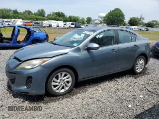 2012 Mazda 3 i Grand Touring with VIN JM1BL1W76C1631716, listed as a Copart auction lot 59774385 with 173,518 mi miles and Salvage title. Bid and sale history available at DreamBid. Image 1.