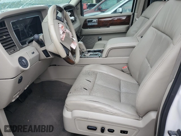 2014 Lincoln Navigator z VIN 5LMJJ2J51EEL08112, wystawiony jako Copart lot #54723164 z przebiegiem 135 575 mil mil oraz Szkoda całkowita • Salvage title. Historia ofert i sprzedaży dostępna na DreamBid. Obrazek 7.