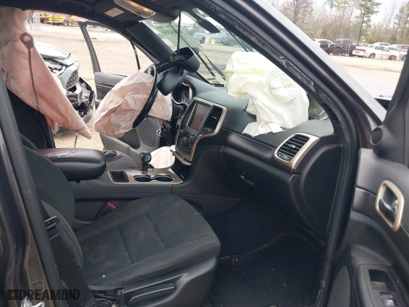 2014 Jeep Grand Cherokee Laredo with VIN 1C4RJEAG1EC573704, listed as a IAAI auction lot 41864355 with 141,970 mi miles. Bid and sale history available at carsss.com. Image 5.