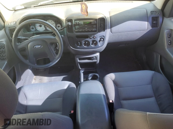 2004 Ford Escape XLS с VIN 1FMYU02194KB20656, выставлен на аукционе Copart как лот 54820755 с пробегом 107 447 миль миль и Списание • Salvage title. История ставок и продаж доступна на DreamBid. Изображение 8.