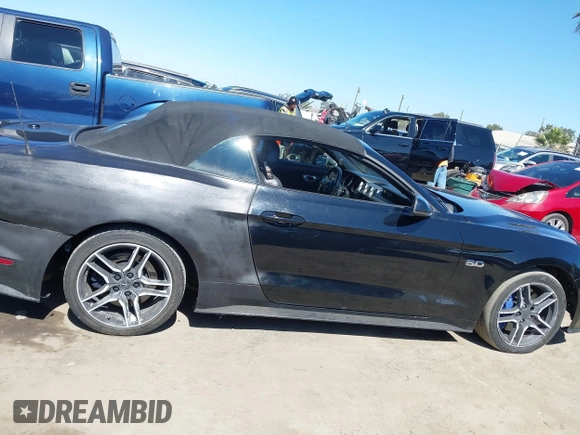 2019 Ford Mustang GT Premium z VIN 1FATP8FF5K5193437, wystawiony jako IAAI lot #42608815 z przebiegiem 67 115 mil mil oraz . Historia ofert i sprzedaży dostępna na DreamBid. Obrazek 13.