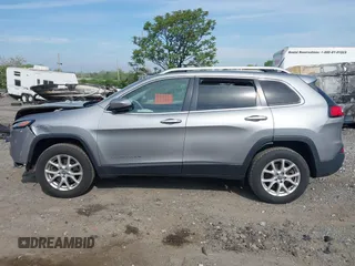 2015 Jeep Cherokee Latitude with VIN 1C4PJMCBXFW639671, listed as a IAAI auction lot 42132976 with 88,931 mi miles. Bid and sale history available at carsss.com. Image 13.