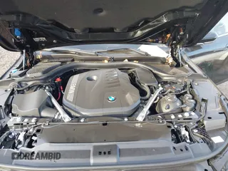 2024 BMW 5 Series 540i xDrive with VIN WBA63FJ08RCS79869, listed as a IAAI auction lot 40786364 with 4,900 mi miles. Bid and sale history available at carsss.com. Image 10.