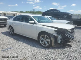 2015 Volkswagen Passat 2.0L TDI SE w/Sunroof with VIN 1VWBV7A32FC093846, listed as a Copart auction lot 52032715 with 124,434 mi miles and Salvage Title. Bid and sale history available at carsss.com. Image 4.