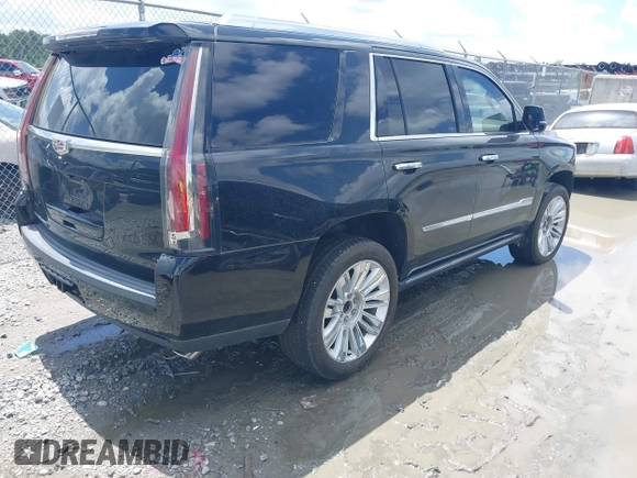 2019 Cadillac Escalade Platinum with VIN 1GYS4DKJ9KR138333, listed as a IAAI auction lot 42523430 with 104,787 mi miles and . Bid and sale history available at DreamBid. Image 4.