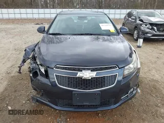 2014 Chevrolet Cruze LTZ z VIN 1G1PG5SB7E7335060, wystawiony jako IAAI lot #41710133 z przebiegiem 170 000 mil mil oraz . Historia ofert i sprzedaży dostępna na DreamBid. Obrazek 12.