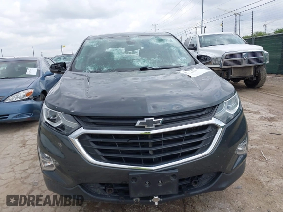 2020 Chevrolet Equinox LT z VIN 2GNAXKEV9L6105008, wystawiony jako IAAI lot #42114279 z przebiegiem 147 489 mil mil oraz . Historia ofert i sprzedaży dostępna na DreamBid. Obrazek 12.