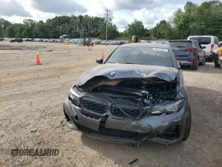 2022 BMW 3 Series M340i xDrive with VIN WBA5U9C02NFL65825, listed as a Copart auction lot 60244064 with 22,548 mi miles and Salvage Title. Bid and sale history available at DreamBid. Image 5.