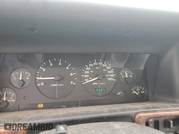 1997 Jeep Grand Cherokee Limited with VIN 1J4GX78YXVC716353, listed as a Copart auction lot 85207974 with 115,527 mi miles and Salvage Title. Bid and sale history available at carsss.com. Image 9.