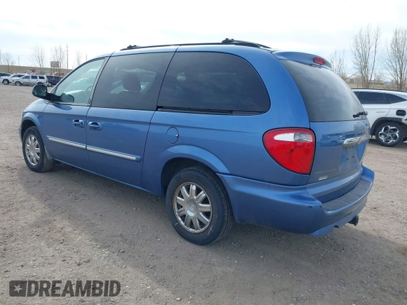 2007 Chrysler Town & Country Touring z VIN 2A4GP54L17R125711, wystawiony jako IAAI lot #41865946 z przebiegiem 169 558 mil mil oraz . Historia ofert i sprzedaży dostępna na DreamBid. Obrazek 3.