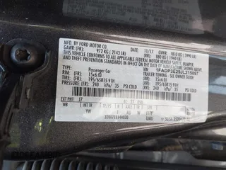 2018 Ford Focus S with VIN 1FADP3E29JL215097, listed as a IAAI auction lot 41457843 with 115,891 mi miles. Bid and sale history available at carsss.com. Image 9.