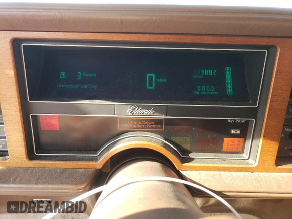 1988 Cadillac Eldorado with VIN 1G6EL1153JU612185, listed as a Copart auction lot 83786144 with 133,882 mi miles and Salvage Title. Bid and sale history available at DreamBid. Image 9.