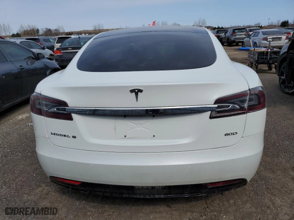 2017 Tesla Model S 100D with VIN 5YJSA1E24HF186757, listed as a Copart auction lot 51511745 with 242,779 mi miles and Salvage Title. Bid and sale history available at carsss.com. Image 6.