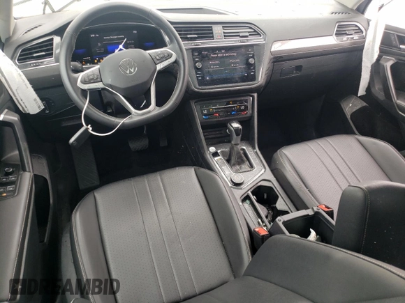 2023 Volkswagen Tiguan SE с VIN 3VVMB7AX7PM008282, выставлен на аукционе Copart как лот 55639525 с пробегом 32 490 миль миль и Списание • Salvage title. История ставок и продаж доступна на DreamBid. Изображение 8.