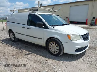 2014 Ram Cargo Van Tradesman z VIN 2C4JRGAG1ER353083, wystawiony jako IAAI lot #42752672 z przebiegiem 150 158 mil mil oraz . Historia ofert i sprzedaży dostępna na DreamBid. Obrazek 1.