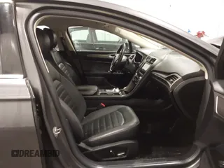 2018 Ford Fusion Energi SE with VIN 3FA6P0PU3JR203714, listed as a IAAI auction lot 41698507 with 168,609 mi miles. Bid and sale history available at carsss.com. Image 5.