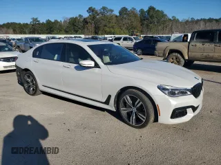 2019 BMW 7 Series 750i with VIN WBA7F0C5XKGM25897, listed as a Copart auction lot 86758004 with 68,700 mi miles and Salvage title. Bid and sale history available at DreamBid. Image 4.