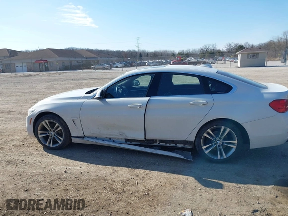 2016 BMW 4 Series 428i xDrive with VIN WBA4C9C59GG138090, listed as a IAAI auction lot 41560267 with 94,010 mi miles and . Bid and sale history available at carsss.com. Image 14.