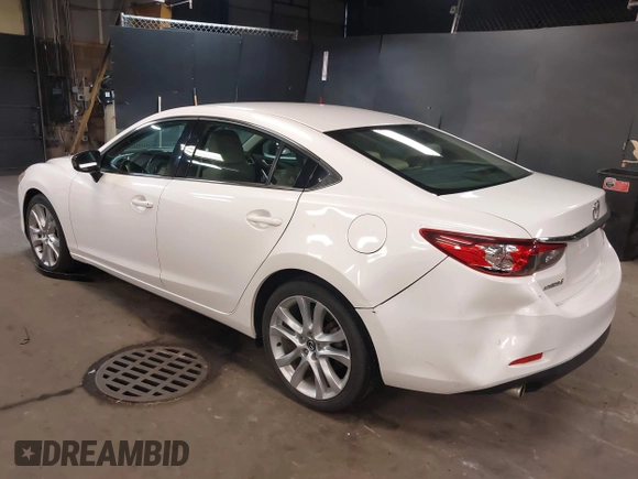2014 Mazda Mazda6 i Touring with VIN JM1GJ1V68E1147067, listed as a IAAI auction lot 42105878 with 102,684 mi miles. Bid and sale history available at carsss.com. Image 3.