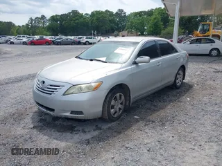 2007 Toyota Camry CE with VIN 4T1BE46KX7U074048, listed as a IAAI auction lot 42101519 with 214,034 mi miles and . Bid and sale history available at DreamBid. Image 2.