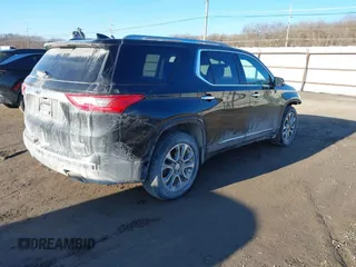 2018 Chevrolet Traverse Premier z VIN 1GNEVJKW5JJ174261, wystawiony jako IAAI lot #41656906 z przebiegiem 101 908 mil mil oraz . Historia ofert i sprzedaży dostępna na DreamBid. Obrazek 4.