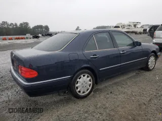 1997 Mercedes-Benz E-Class with VIN WDBJF55FXVJ027722, listed as a Copart auction lot 44835585 with 0 mi miles and Salvage Title. Bid and sale history available at carsss.com. Image 3.
