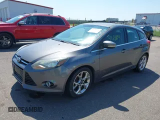 2014 Ford Focus Titanium with VIN 1FADP3N22EL317007, listed as a IAAI auction lot 42641134 with 159,705 mi miles and . Bid and sale history available at DreamBid. Image 2.