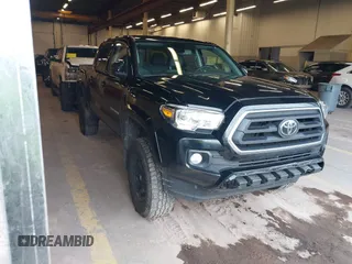 2021 Toyota Tacoma SR z VIN 3TMCZ5AN0MM400136, wystawiony jako IAAI lot #41806557 z przebiegiem 40 409 mil mil oraz . Historia ofert i sprzedaży dostępna na DreamBid. Obrazek 1.