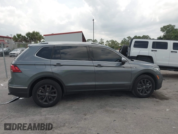 2024 Volkswagen Tiguan SE with VIN 3VVNB7AX4RM138429, listed as a IAAI auction lot 42303215 with Not provided miles and . Bid and sale history available at DreamBid. Image 13.