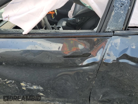 2024 Tesla Model Y Long Range z VIN 7SAYGDEEXRA324517, wystawiony jako Copart lot #55274615 z przebiegiem Nie podano mil oraz Szkoda całkowita • Salvage title. Historia ofert i sprzedaży dostępna na DreamBid. Obrazek 7.