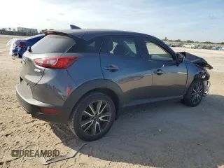 2017 Mazda CX-3 Touring z VIN JM1DKDC77H0151148, wystawiony jako Copart lot #81897434 z przebiegiem Nie podano mil oraz Szkoda całkowita • Salvage title. Historia ofert i sprzedaży dostępna na DreamBid. Obrazek 3.