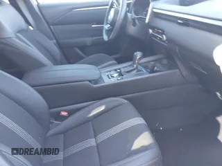 2024 Mazda CX-50 S Select with VIN 7MMVABAMXRN238079, listed as a IAAI auction lot 41563281 with 5,576 mi miles and . Bid and sale history available at DreamBid. Image 5.