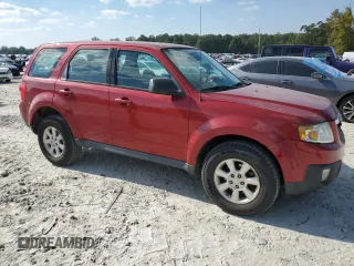 2011 Mazda Tribute Touring with VIN 4F2CY0C7XBKM00671, listed as a Copart auction lot 75431144 with 140,748 mi miles and Clean Title. Bid and sale history available at carsss.com. Image 4.