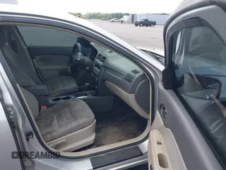 2012 Ford Fusion S with VIN 3FAHP0GAXCR270957, listed as a IAAI auction lot 42122294 with 230,489 mi miles and . Bid and sale history available at carsss.com. Image 5.
