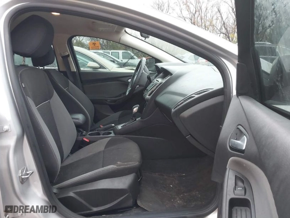 2014 Ford Focus SE with VIN 1FADP3F20EL406508, listed as a IAAI auction lot 40809098 with 89,731 mi miles. Bid and sale history available at carsss.com. Image 5.