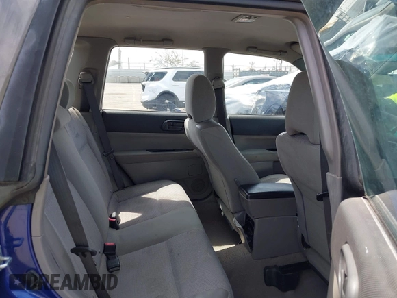 2003 Subaru Forester X with VIN JF1SG63643H709954, listed as a IAAI auction lot 42034404 with 193,026 mi miles. Bid and sale history available at carsss.com. Image 8.