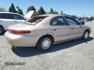 1996 Mercury Sable LS z VIN 1MELM53S8TA610706, wystawiony jako Copart lot #59506535 z przebiegiem 64 513 mil mil oraz Tytuł czysty. Historia ofert i sprzedaży dostępna na DreamBid. Obrazek 3.