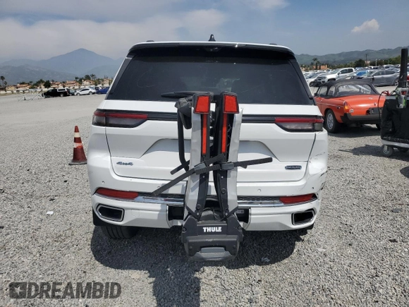 2023 Jeep Grand Cherokee Overland with VIN 1C4RJHDG9PC517056, listed as a Copart auction lot 54929955 with 18,418 mi miles and Salvage title. Bid and sale history available at DreamBid. Image 6.