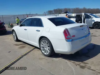 2011 Chrysler 300 with VIN 2C3CA6CTXBH559626, listed as a IAAI auction lot 41876062 with 112,045 mi miles. Bid and sale history available at carsss.com. Image 3.