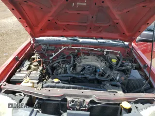 2002 Nissan Frontier XE z VIN 1N6ED29Y12C388949, wystawiony jako Copart lot #55235875 z przebiegiem 212 944 mil mil oraz Szkody całkowita. Historia ofert i sprzedaży dostępna na DreamBid. Obrazek 11.