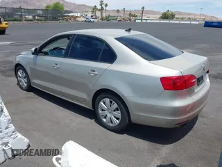 2014 Volkswagen Jetta SE with VIN 3VWD17AJ9EM271431, listed as a IAAI auction lot 42419304 with 143,599 mi miles and . Bid and sale history available at DreamBid. Image 3.