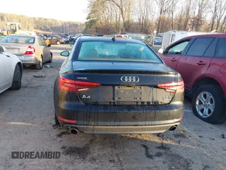 2017 Audi A4 Premium z VIN WAUANAF47HN039038, wystawiony jako IAAI lot #41439609 z przebiegiem 121 410 mil mil oraz . Historia ofert i sprzedaży dostępna na DreamBid. Obrazek 16.