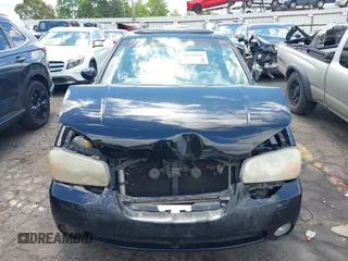 2002 Nissan Maxima GXE z VIN JN1DA31DX2T411198, wystawiony jako IAAI lot #42188090 z przebiegiem Nie podano mil oraz . Historia ofert i sprzedaży dostępna na DreamBid. Obrazek 12.