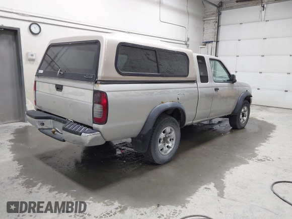 1998 Nissan Frontier XE with VIN 1N6DD26Y5WC344751, listed as a IAAI auction lot 42142806 with 200,111 mi miles and . Bid and sale history available at DreamBid. Image 4.