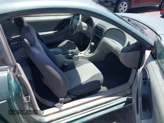 2001 Ford Mustang Standard z VIN 1FAFP404X1F217978, wystawiony jako IAAI lot #42569548 z przebiegiem 199 730 mil mil oraz . Historia ofert i sprzedaży dostępna na DreamBid. Obrazek 5.