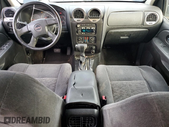 2006 GMC Envoy SLT with VIN 1GKDS13S762343520, listed as a Copart auction lot 82714134 with 0 mi miles and Clean Title. Bid and sale history available at carsss.com. Image 8.