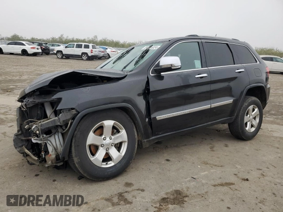 2013 Jeep Grand Cherokee Limited with VIN 1C4RJEBG5DC657005, listed as a Copart auction lot 84101024 with 124,055 mi miles and Salvage Title. Bid and sale history available at carsss.com. Image 1.