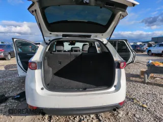 2021 Mazda CX-5 Touring with VIN JM3KFBCM0M0355894, listed as a Copart auction lot 83593464 with 80,703 mi miles and Salvage Title. Bid and sale history available at carsss.com. Image 6.