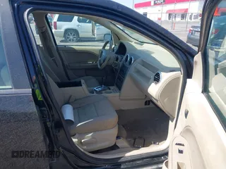 2005 Ford Freestyle SE with VIN 1FMZK01165GA48072, listed as a IAAI auction lot 41782025 with 235,073 mi miles. Bid and sale history available at carsss.com. Image 5.