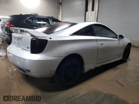 2002 Toyota Celica GT with VIN JTDDR32T720128528, listed as a Copart auction lot 79963994 with 79,901 mi miles and Salvage Title. Bid and sale history available at carsss.com. Image 3.